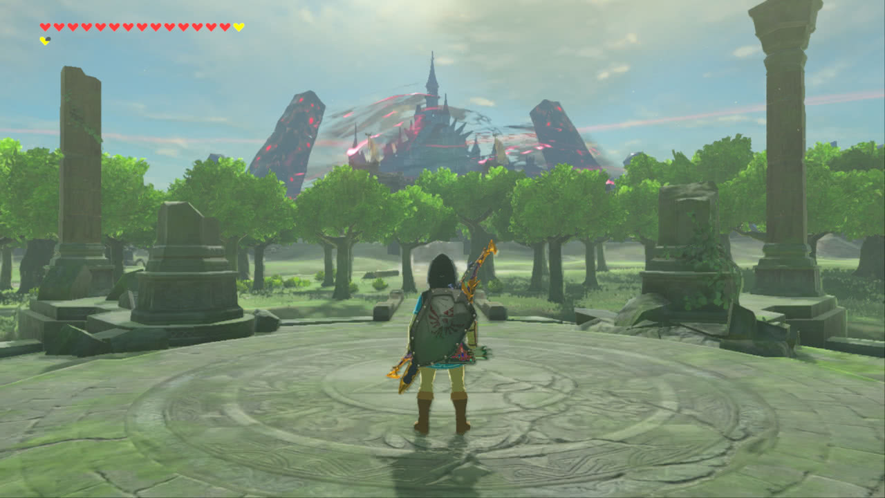Link stands in the midst of some ruins facing away from the viewer, looking at Hyrule Castle in the distance surrounded by a malevolent aura.
